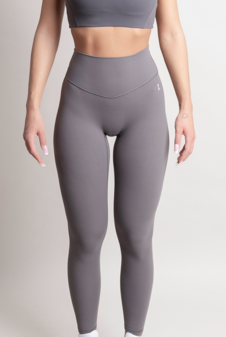 Front view of woman wearing grey NOIR flared leggings by ZANOS Apparel Bestsellers