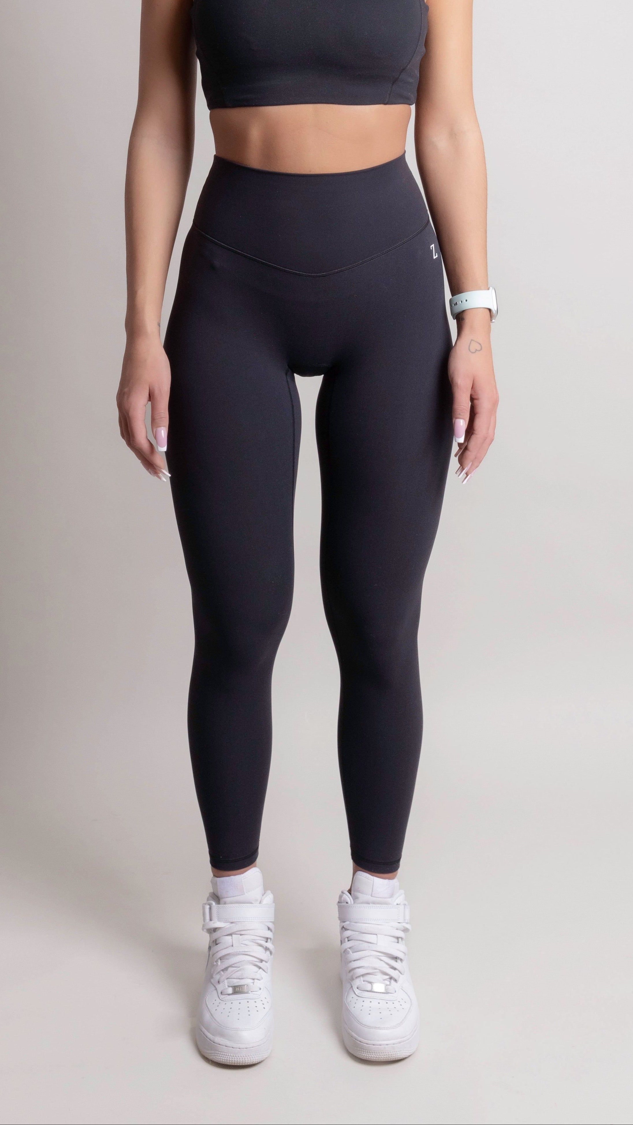 Model wearing NOIR Yoga Leggings Black with a supportive fit, designed for comfort and movement.
