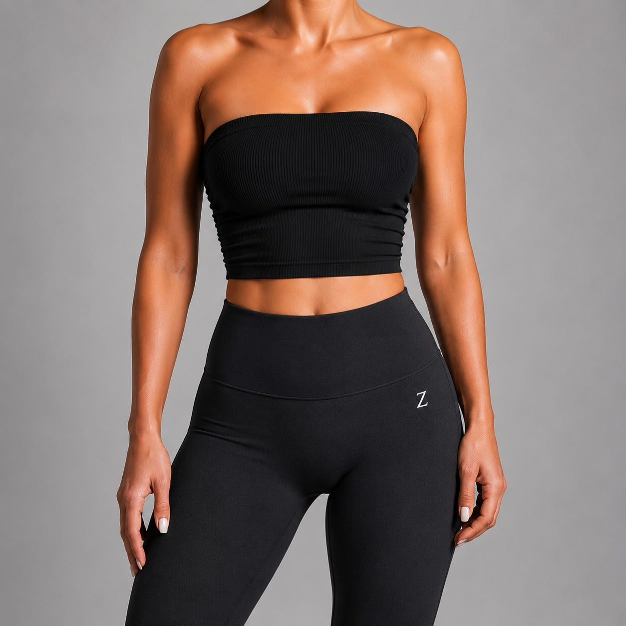 Close-up of NOIR Bandeau Top in Black ribbed texture.