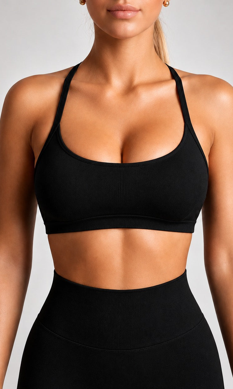 Black Flow Bra for women shown from the front against a light studio background