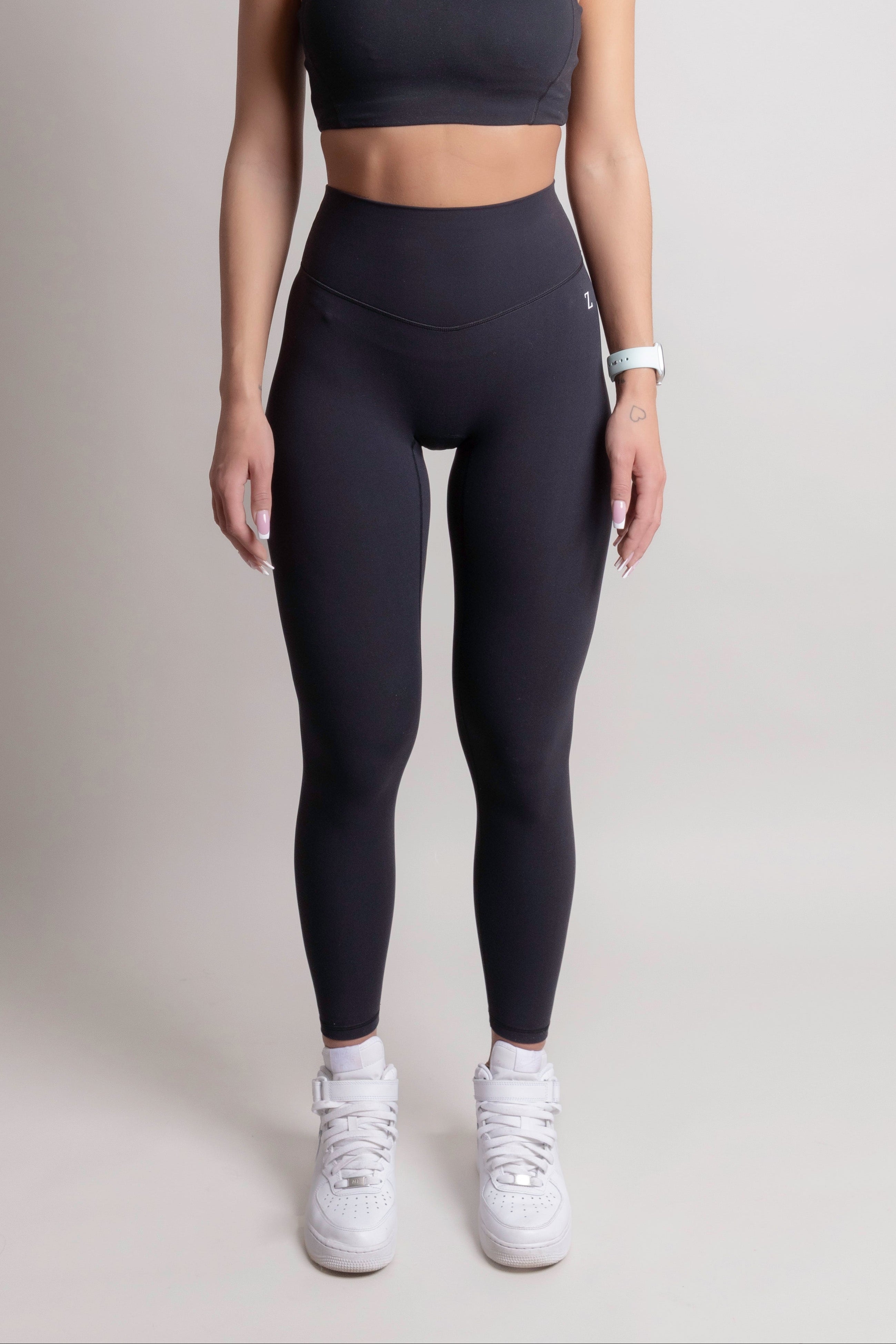 Model wearing NOIR Yoga Leggings Black with a supportive fit, designed for comfort and movement.