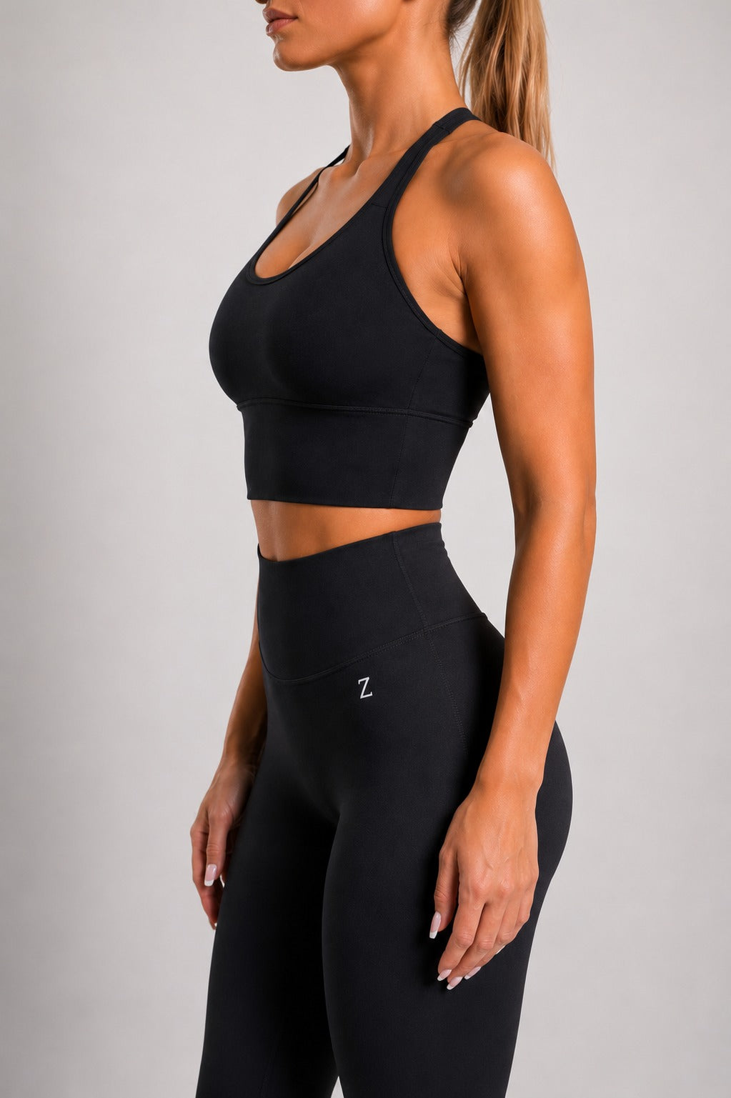 Back view of NOIR Cross Top in Black showing cross-back straps.