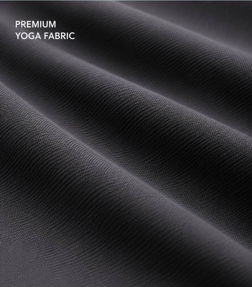 Dark charcoal gray fabric with a fine textured weave, shown with elegant draped folds. White text in the upper left corner reads 'PREMIUM YOGA FABRIC'.